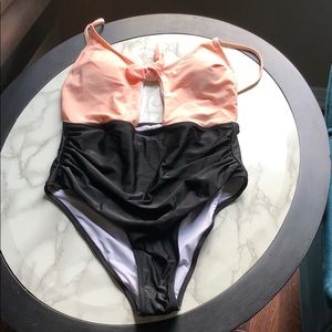 Medium pink and black one piece